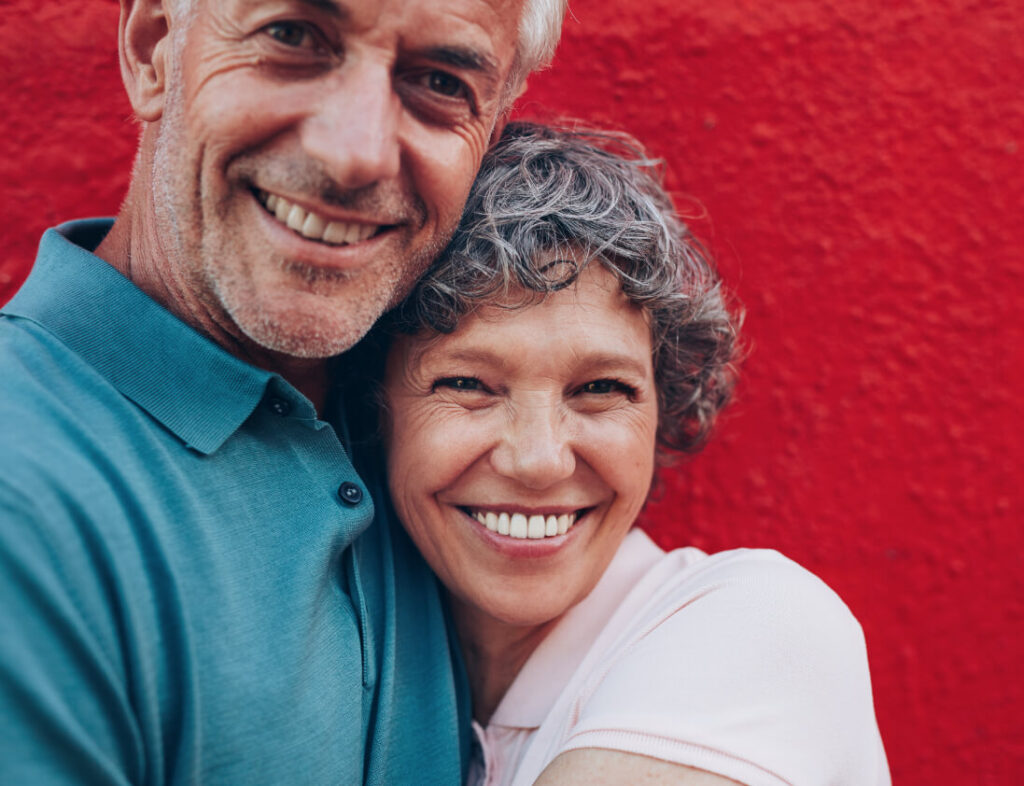 Cheerful mature couple embracing each other